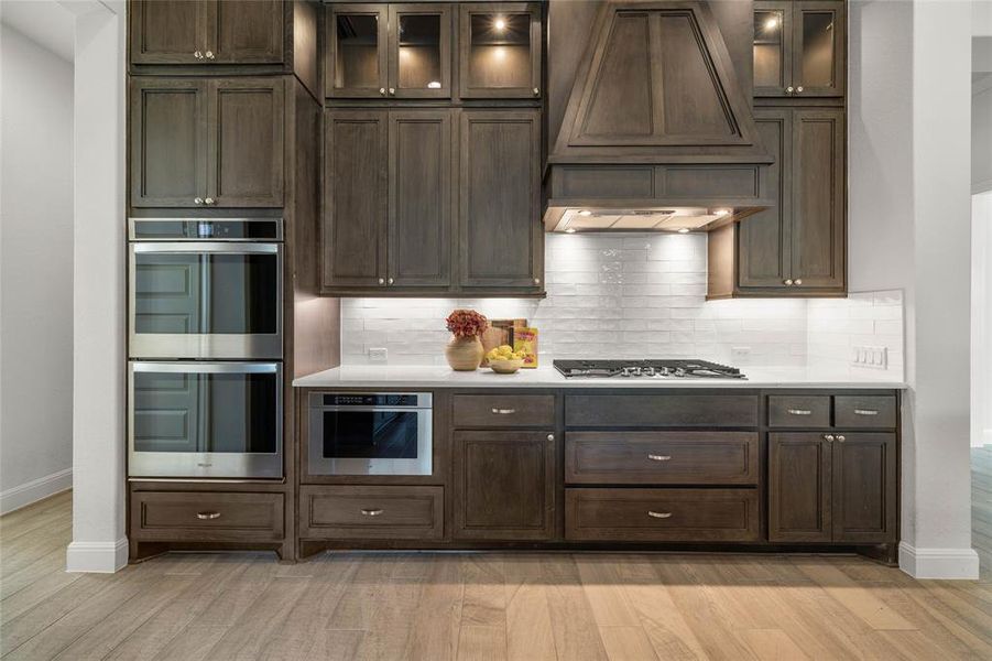 Your Resident Chef will Adore the Custom Hood, Gas Cooktop and Double Ovens!