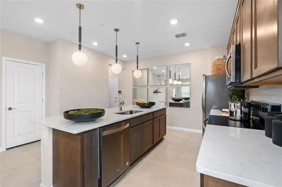 Furnished interior view inside a new home in The Cove at Nona Sound, Orlando (Image 11). Furnished interior view inside a new home in The Cove at Nona Sound, Orlando (Image 11).