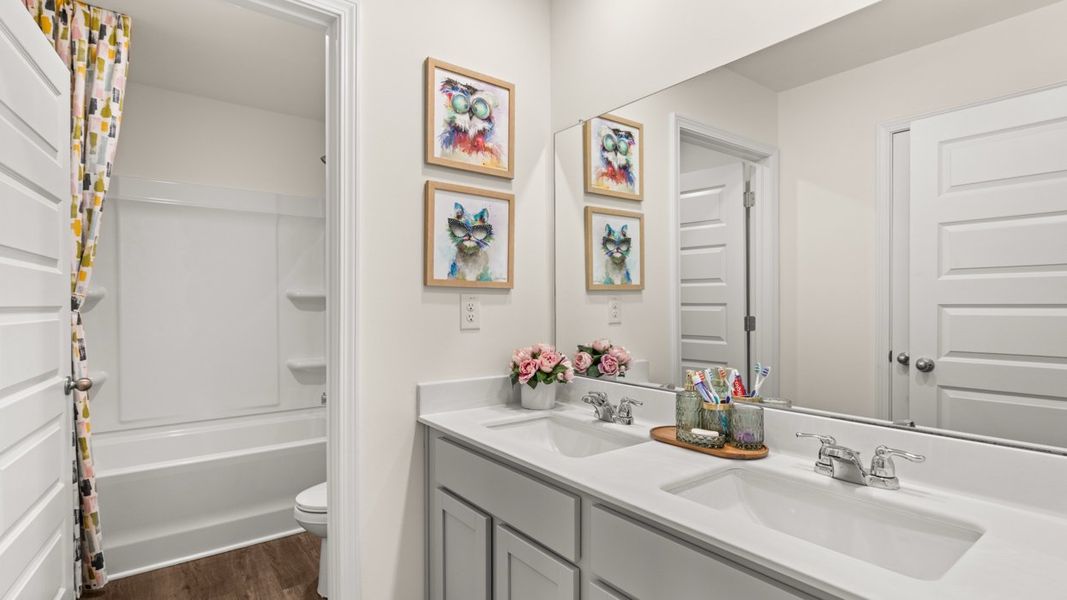 Representative furnished interior of a home built from the Holbrook by D.R. Horton in Independence, Loganville (Image 15).