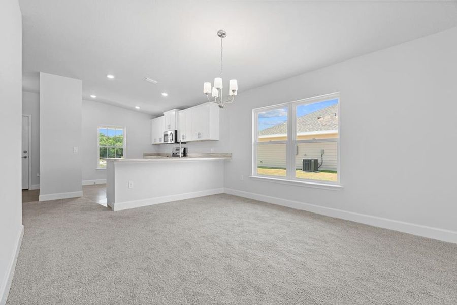 Representative unfurnished interior of a home built from the Plan 1478 by Adams Homes in Rolling Hills, Bell (Image 12). Representative unfurnished interior of a home built from the Plan 1478 by Adams Homes in Rolling Hills, Bell (Image 12).