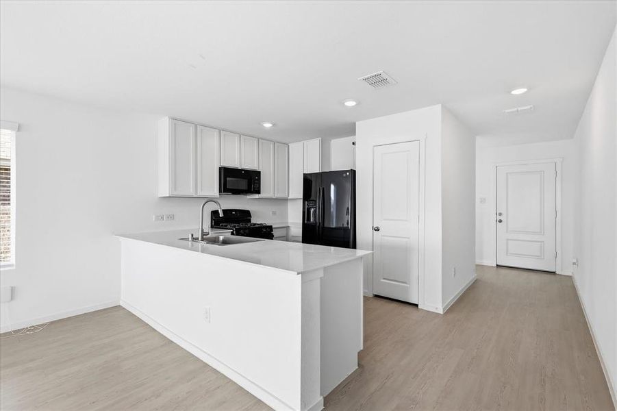 Furnished interior view inside a new home in Mobberly Farms, Pilot Point (Image 6). Furnished interior view inside a new home in Mobberly Farms, Pilot Point (Image 6).