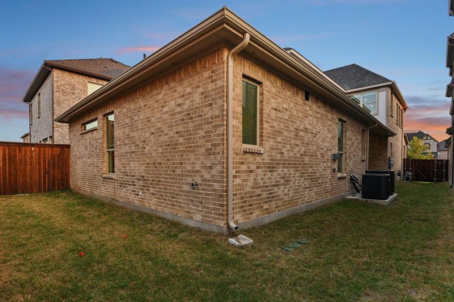 Exterior details and patio area of a home in , Plano (Image 2). Exterior details and patio area of a home in , Plano (Image 2).