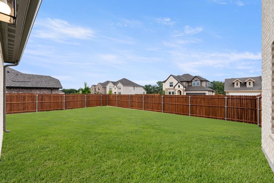 Representative exterior photo of a completed home built from the Phoenix by Impression Homes in Terra Vella, Haslet, TX (Image 24).