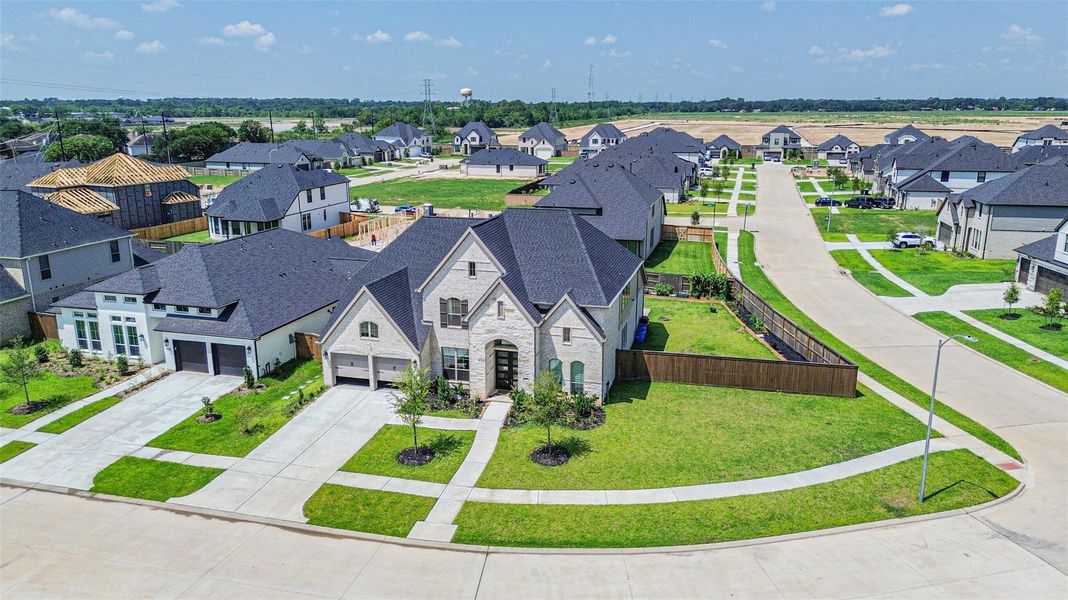 This home is situated on a spacious corner lot and features an elegant stone veneer facade and covered porch. This home is situated on a spacious corner lot and features an elegant stone veneer facade and covered porch.