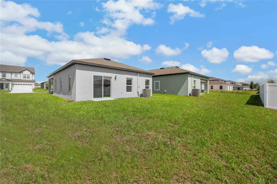 Exterior details and patio area of a home in Gum Lake Preserve, Lake Alfred (Image 4).