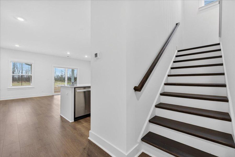 Spacious, unfurnished interior of a new home in The Coves at Lakes of Cane Bay, Summerville (Image 25).