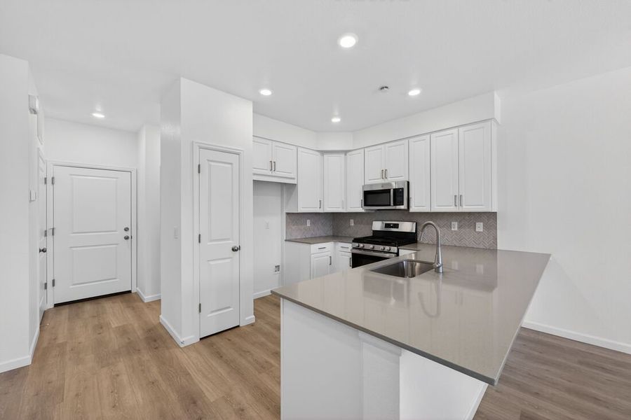 Furnished interior view inside a new home in Parterre, Thornton (Image 3).