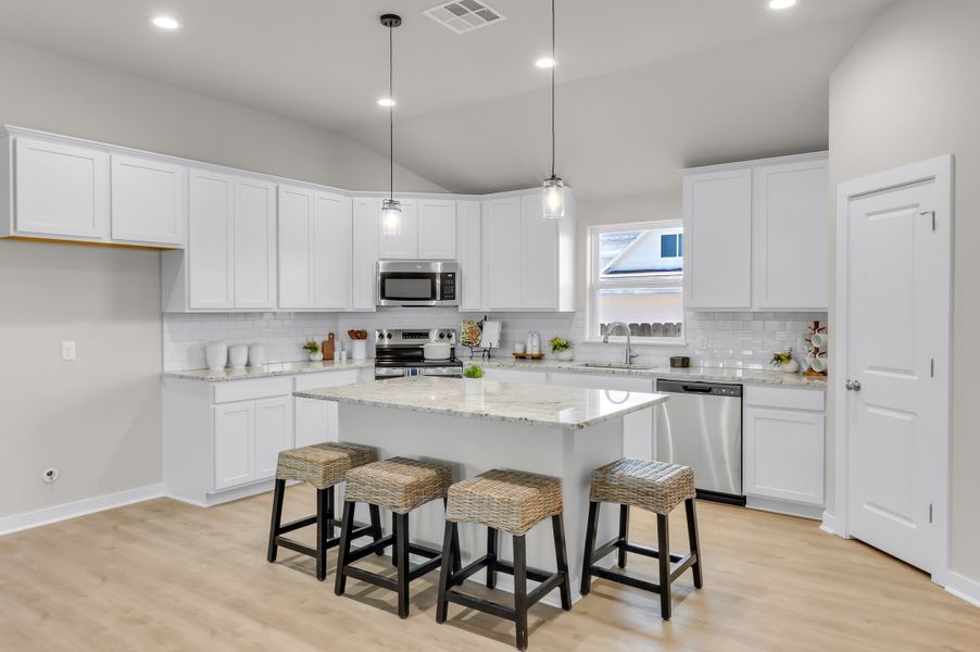 Representative furnished interior of a home built from the The Poppy by Avonley Homes in Rudder Pointe, Bryan (Image 25).
