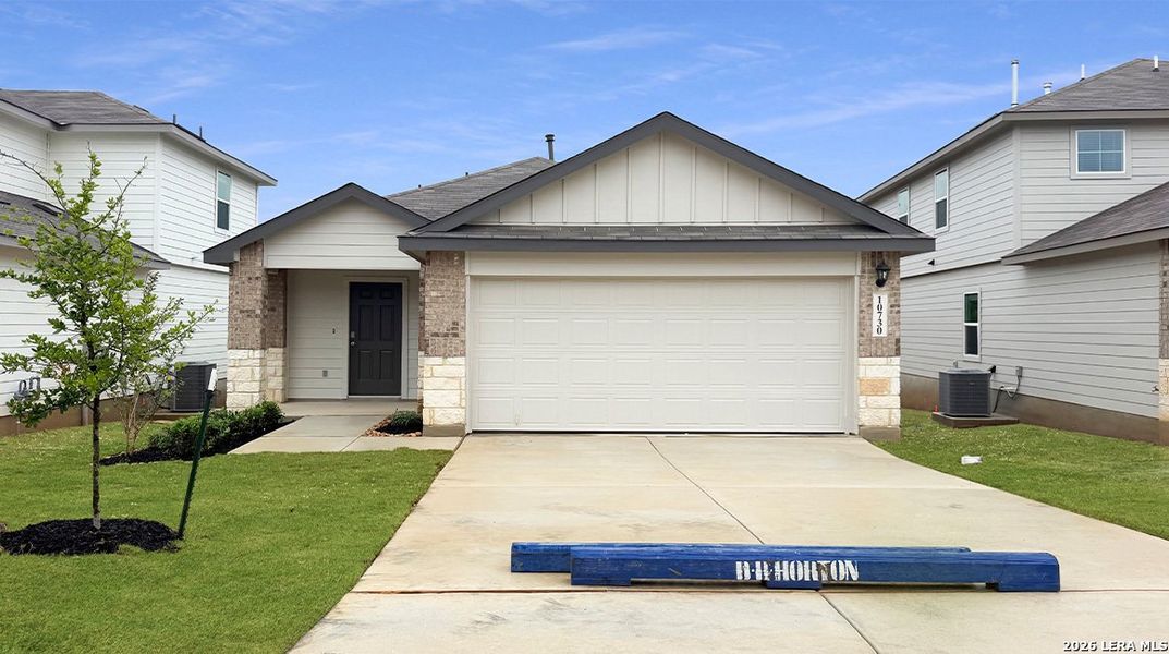 Front exterior of a new home in Applewood, San Antonio, TX, highlighting curb appeal (Image 2). Front exterior of a new home in Applewood, San Antonio, TX, highlighting curb appeal (Image 2).
