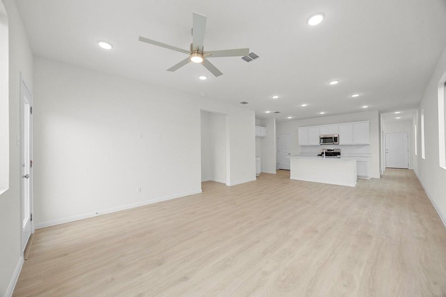 Living Room in the Magnolia home plan by Trophy Signature Homes – REPRESENTATIVE PHOTO