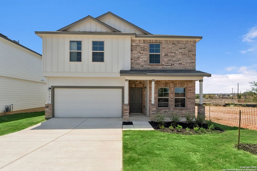 Front exterior of a new home in Mesquite Ridge, San Antonio, TX, highlighting curb appeal (Image 2). Front exterior of a new home in Mesquite Ridge, San Antonio, TX, highlighting curb appeal (Image 2).