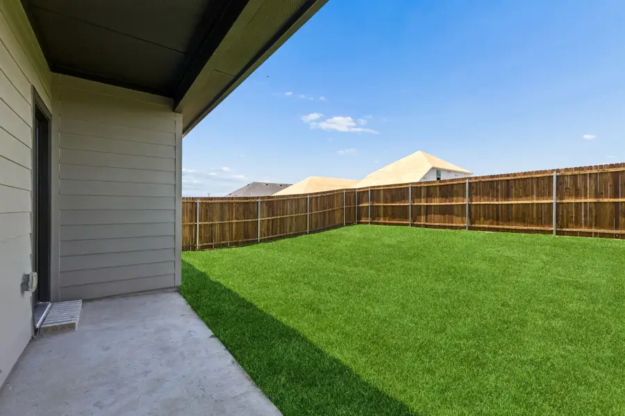 Covered Patio in the Cypress home plan by Trophy Signature Homes - REPRESENTATIVE PHOTO Covered Patio in the Cypress home plan by Trophy Signature Homes - REPRESENTATIVE PHOTO