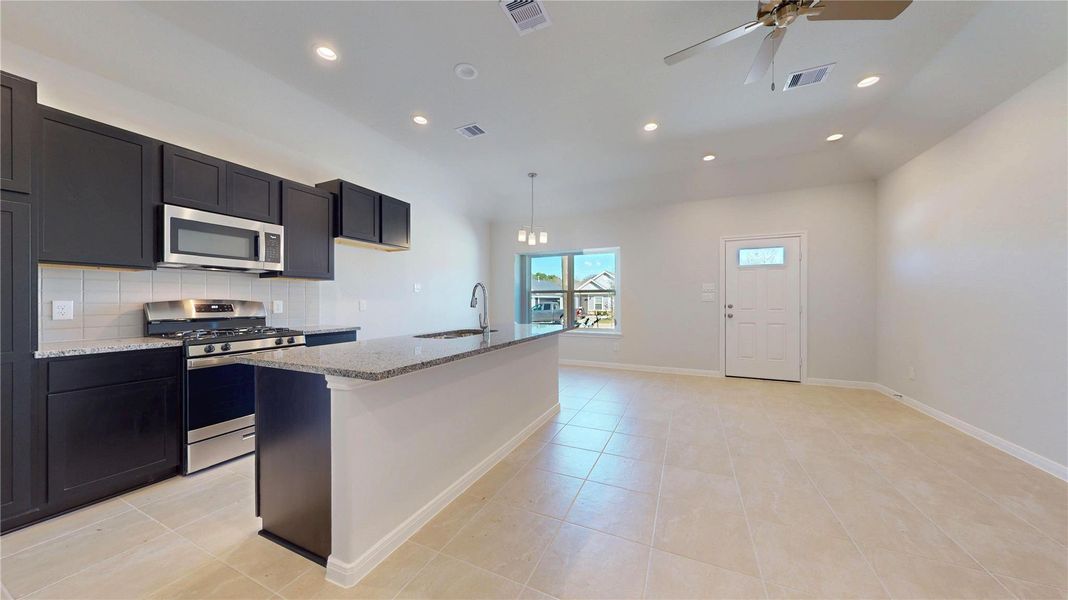 Furnished interior view inside a new home in East Gate Villas, Willis (Image 6).