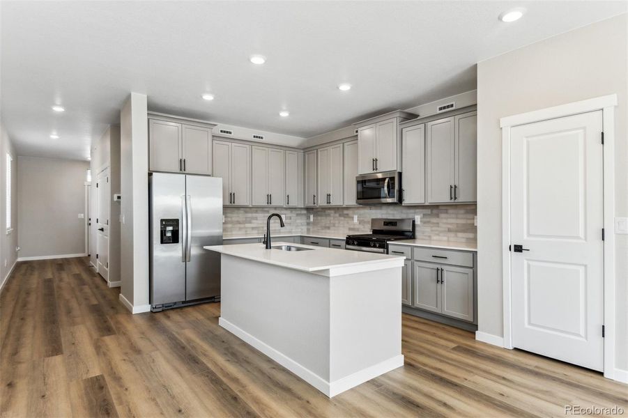 Furnished interior view inside a new home in Second Creek Farm, Commerce City (Image 8).