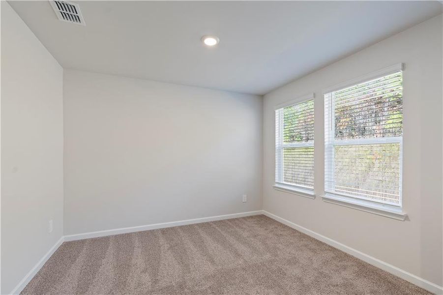 Spacious, unfurnished interior of a new home in Hamilton Crossing, Buford (Image 12).