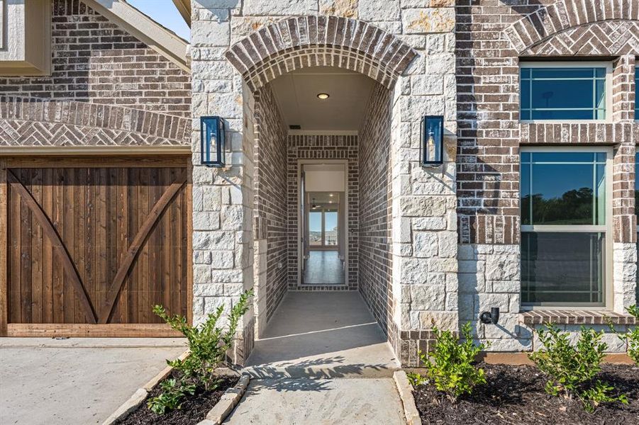 Exterior details and patio area of a home in Parks at Panchasarp Farms 55-60, Burleson (Image 21).