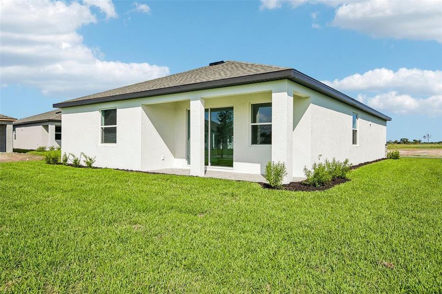 Exterior details and patio area of a home in Coasterra, Palmetto (Image 3).