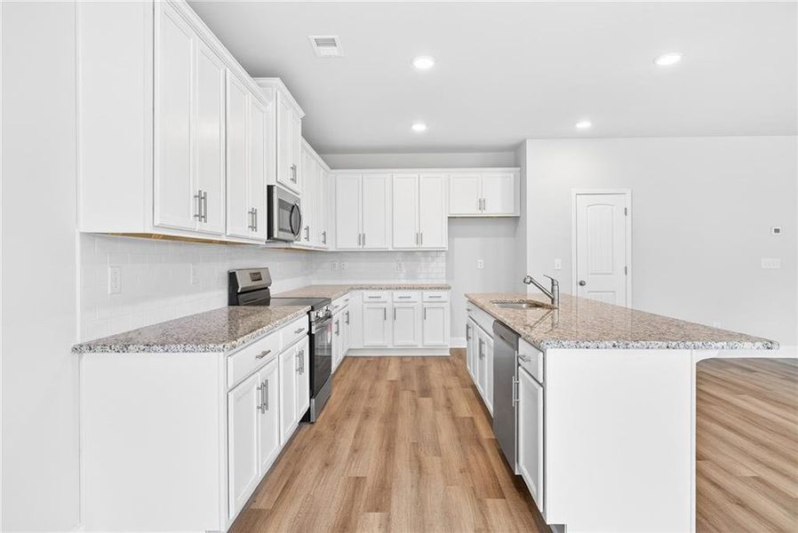 Furnished interior view inside a new home in , Homer (Image 11). Furnished interior view inside a new home in , Homer (Image 11).