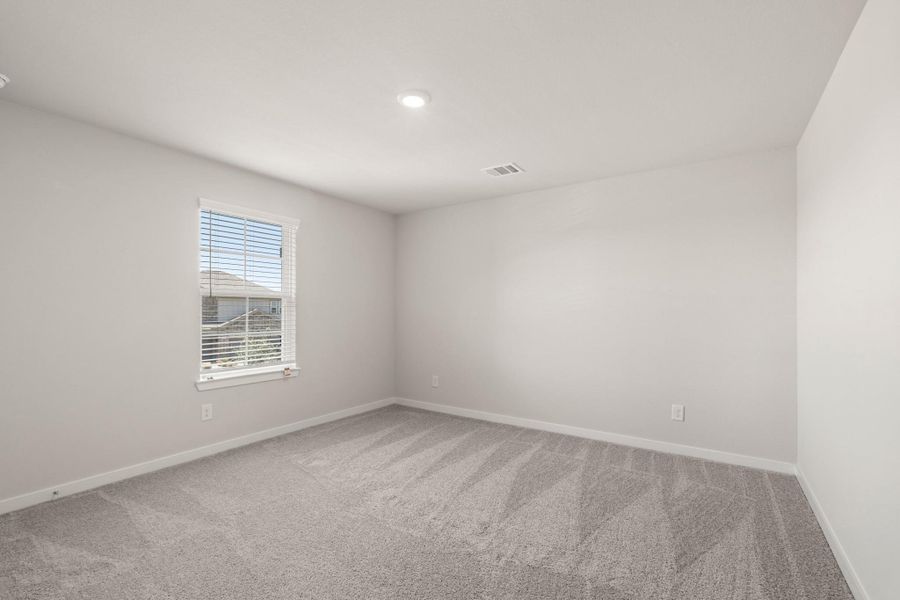 Spacious, unfurnished interior of a new home in Sunterra, Katy (Image 20).