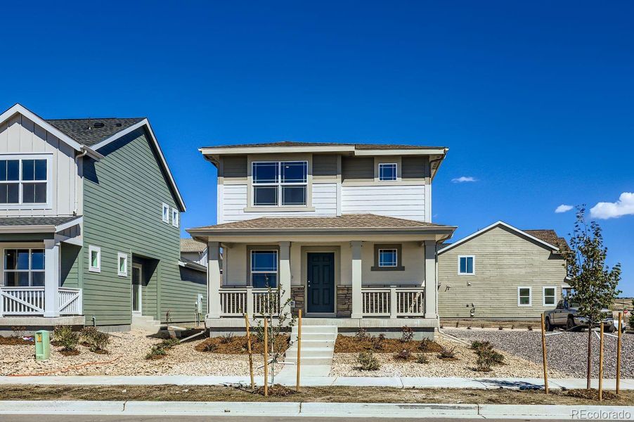 Front exterior of a new home in Percheron: The Explorer Collection, Colorado Springs, CO, highlighting curb appeal (Image 1).