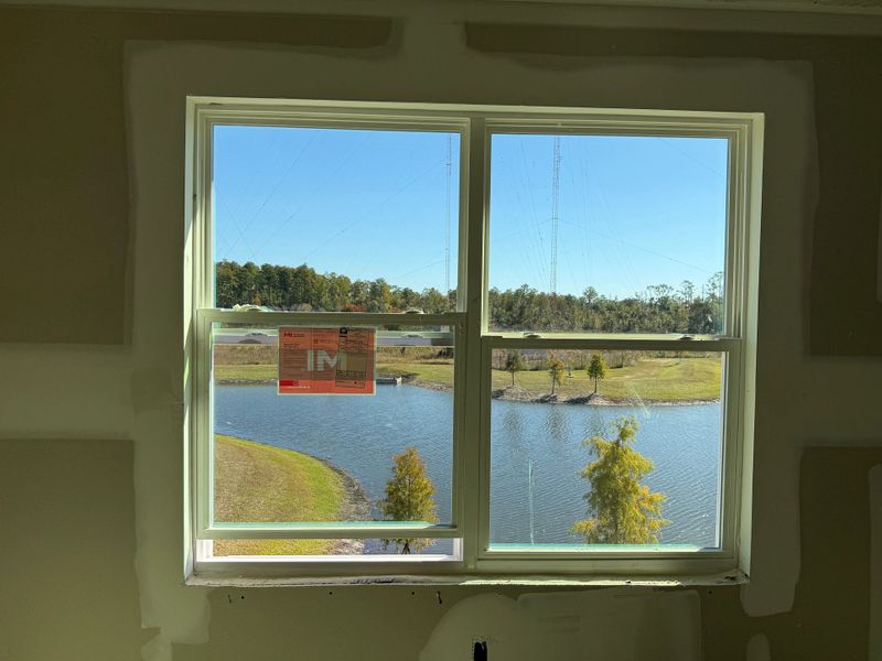 Beautiful pond view from the back of the home