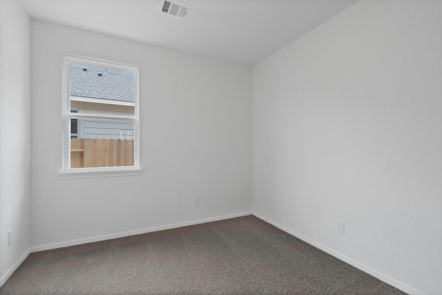 Your secondary bedroom features plush carpet, fresh paint, closet, and a large window that lets in plenty of natural lighting. Your secondary bedroom features plush carpet, fresh paint, closet, and a large window that lets in plenty of natural lighting.