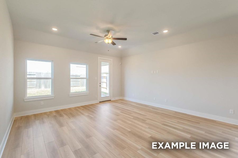 Spacious, unfurnished interior of a new home in Sunterra, Katy (Image 15).