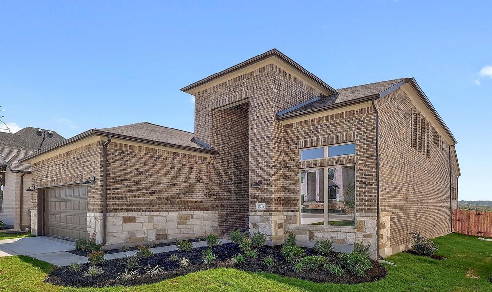 Front exterior of a new home in Lakeside at Tessera - 50', Lago Vista, TX, highlighting curb appeal (Image 16).