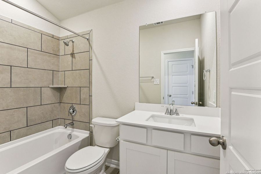 Furnished interior view inside a new home in Remington Ranch, San Antonio (Image 14).