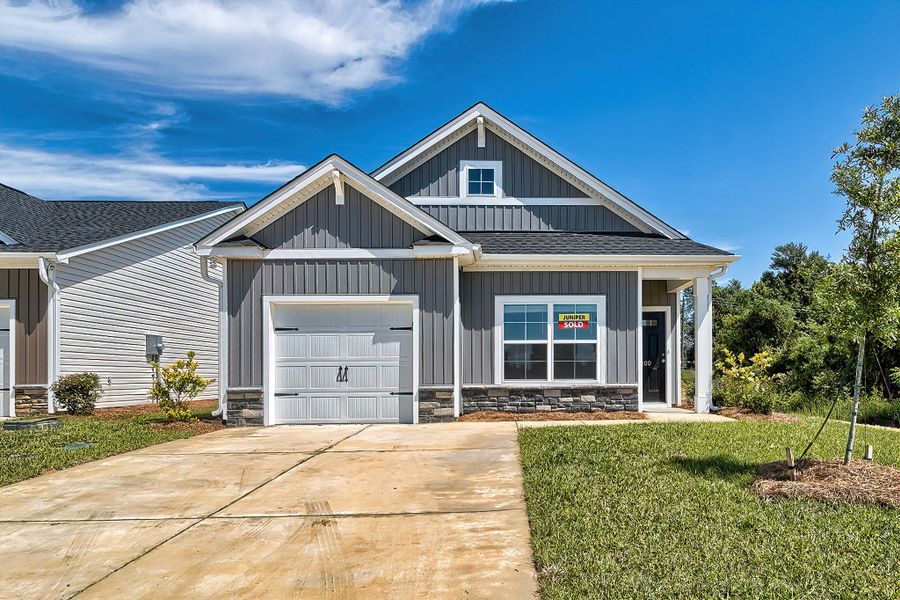 Representative exterior photo of a completed home built from the Juniper B by McGuinn Homes in South Welcome, Greenville, SC (Image 26). Representative exterior photo of a completed home built from the Juniper B by McGuinn Homes in South Welcome, Greenville, SC (Image 26).