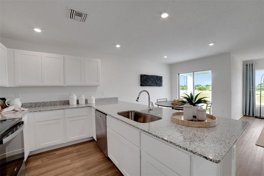 Photos are of a model home or artist rendering; any dimensions listed are approximate and may change. Home aspects and included items may vary and are not intended to form part of any contract or warranty. Home may be virtually staged.