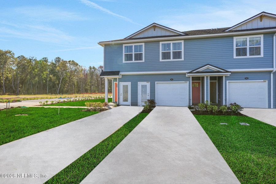 Front exterior of a new home in , Jacksonville, FL, highlighting curb appeal (Image 28).