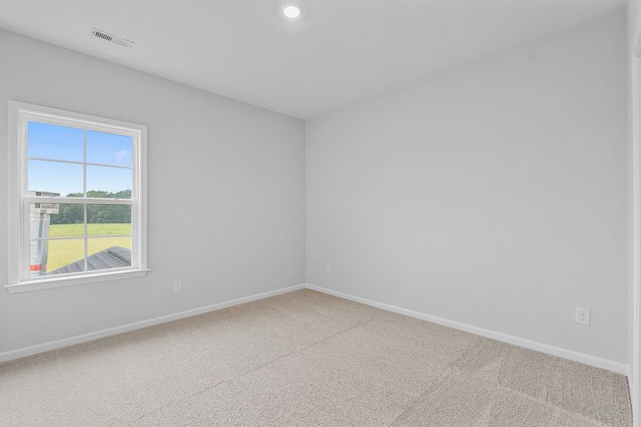 Spacious, unfurnished interior of a new home in Lilah Grove, Summerfield (Image 42).