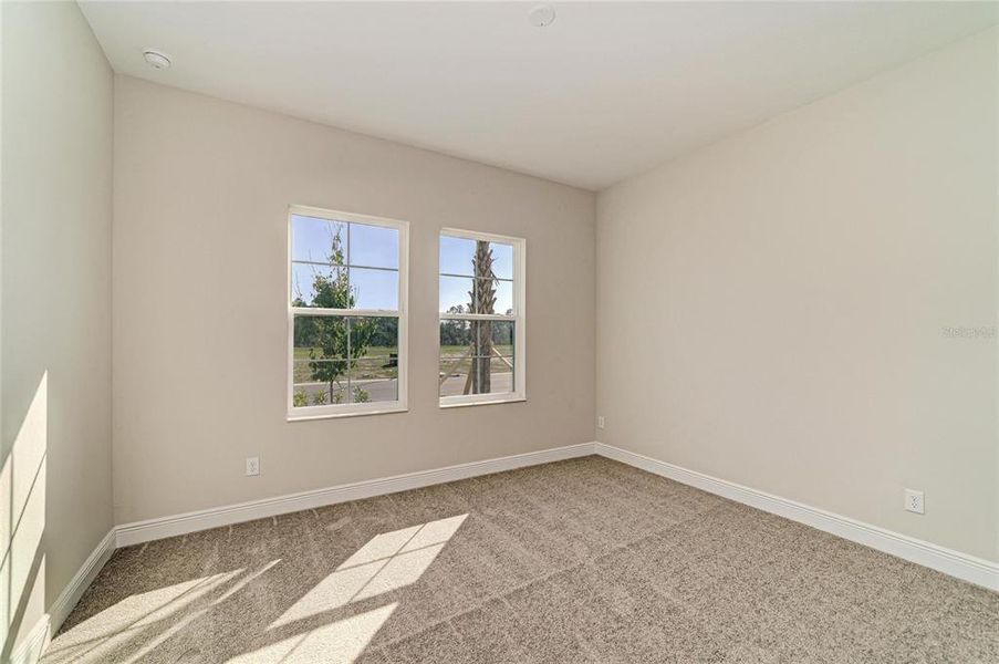 Spacious, unfurnished interior of a new home in Pasadena Woods, Wesley Chapel (Image 33).