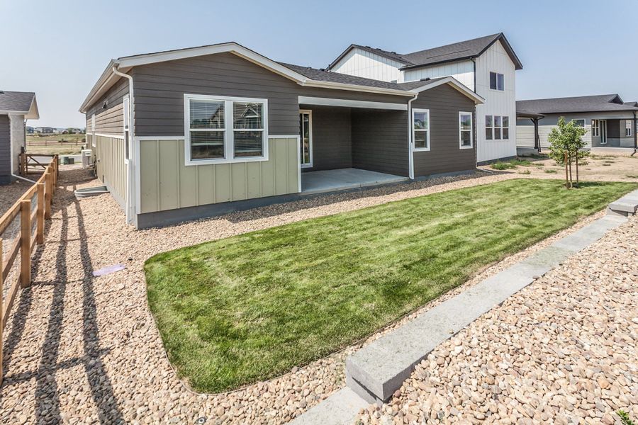 Exterior details and patio area of a home in Prairie Song, Windsor (Image 3).