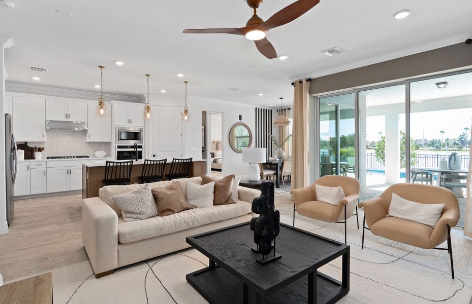Furnished interior view inside a new home in Parkview Reserve, Orlando (Image 7).