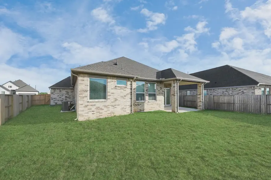 Representative exterior details of a home built from the Bonneville by Chesmar Homes in Meridiana 50's and 60's, Manvel (Image 4).