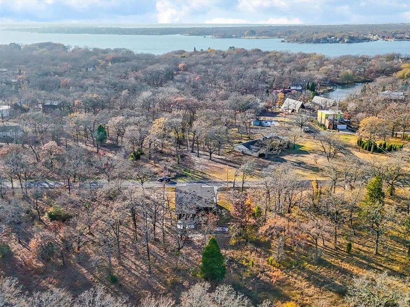 Aerial overview of property's location featuring a nearby body of water