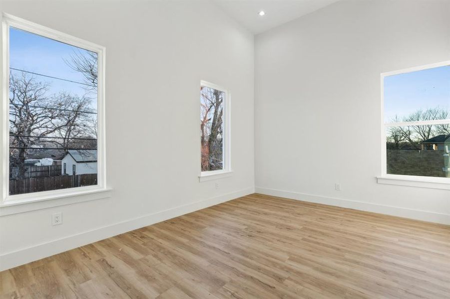 Unfurnished room featuring light wood-type flooring