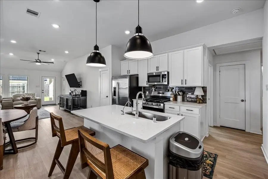Furnished interior view inside a new home in Mustang Crossing, Alvin (Image 17).