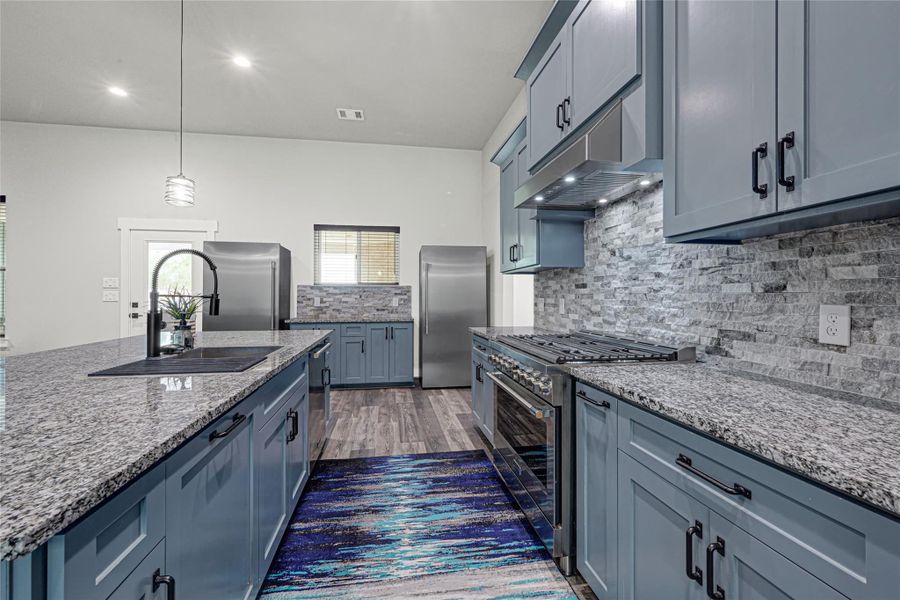 Full sized freezer and refrigerator will convey with the home.