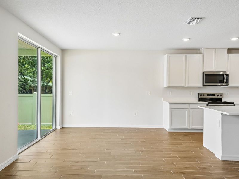 Spacious, unfurnished interior of a new home in The Grove at Stuart Crossing - Classic Series, Bartow (Image 10). Spacious, unfurnished interior of a new home in The Grove at Stuart Crossing - Classic Series, Bartow (Image 10).