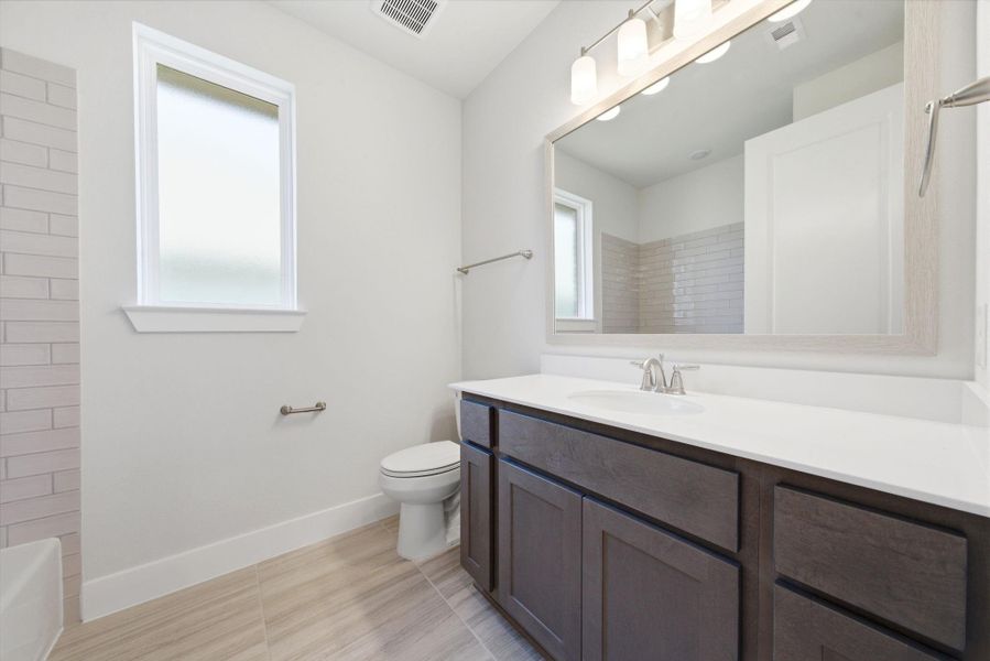 Furnished interior view inside a new home in Chambers Creek, Willis (Image 12).