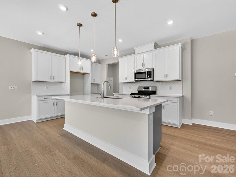 Chef Inspired Kitchen with Dual Tone Cabinets