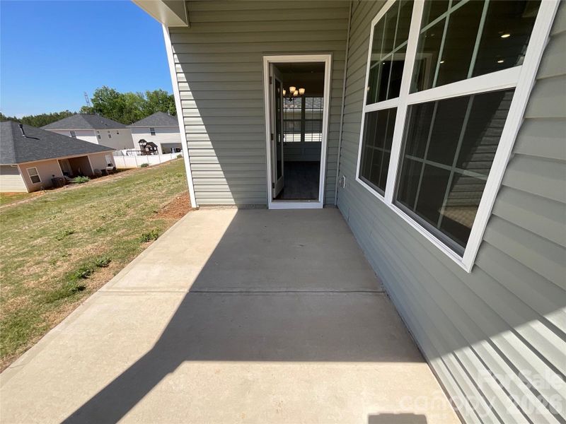 Exterior details and patio area of a home in Village at Parkside, Gastonia (Image 3).
