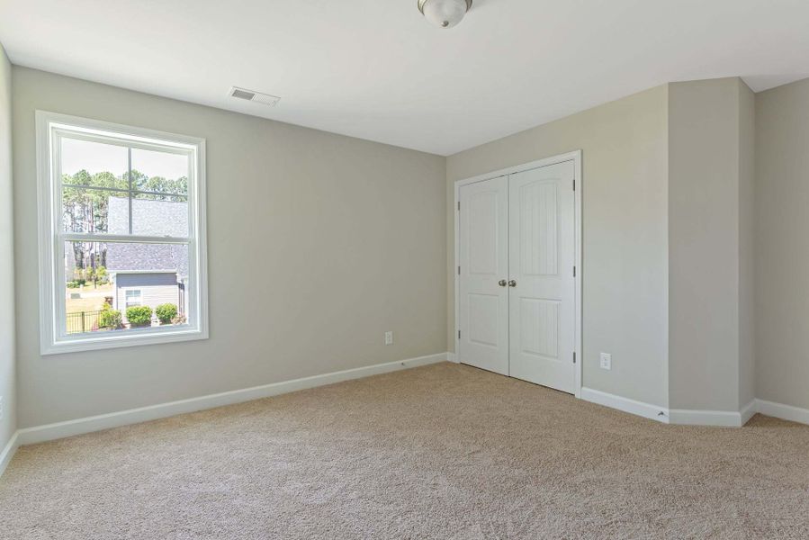 Representative unfurnished interior of a home built from the Brunswick by Caviness & Cates Communities in Maggie Way, Wendell (Image 231). Representative unfurnished interior of a home built from the Brunswick by Caviness & Cates Communities in Maggie Way, Wendell (Image 231).