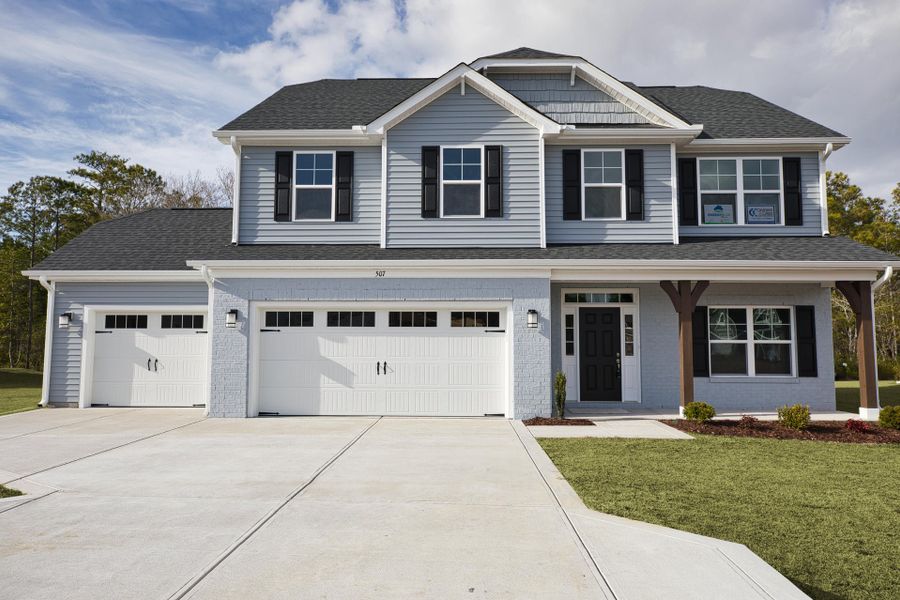 Representative exterior photo of a completed home built from the Drayton by Caviness & Cates Communities in Maggie Way, Wendell, NC (Image 6).