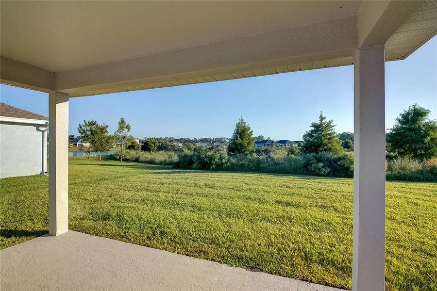 Exterior details and patio area of a home in Aviary at Rutland Ranch, Parrish (Image 2).