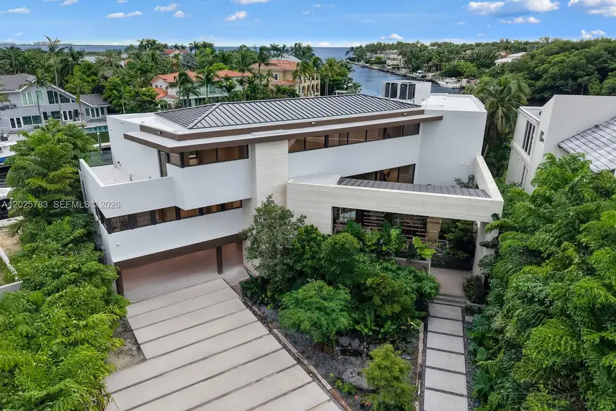 Front exterior of a new home in , Coral Gables, FL, highlighting curb appeal (Image 1). Front exterior of a new home in , Coral Gables, FL, highlighting curb appeal (Image 1).