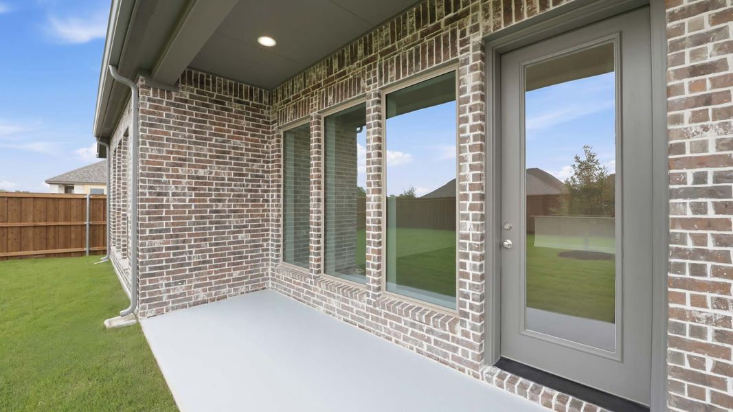 Exterior details and patio area of a home in Meraki, Forney (Image 3).